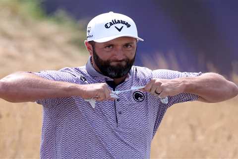 Jon Rahm tears glove apart after hitting first shot out of bounds again in British Open meltdown