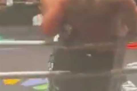 Tyson Fury seemingly kisses opponent mid-match in wild scene
