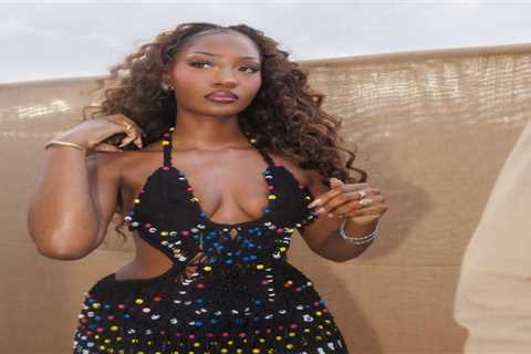 You Ask, We Answer: Tems Wore Mio Made RS Beaded Black Dress at All Points East London