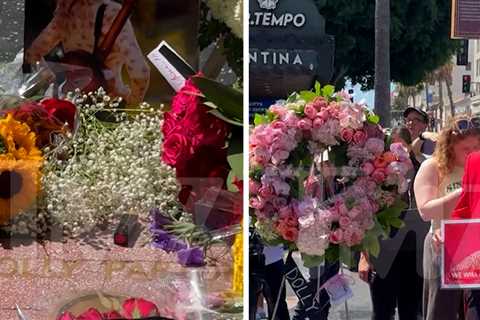 Dolly Parton Fans Cover Her Hollywood Walk of Fame Star With Flowers