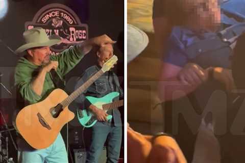 Garth Brooks: Insane Videos Show Fans Carried Out Due To Scorching Heat